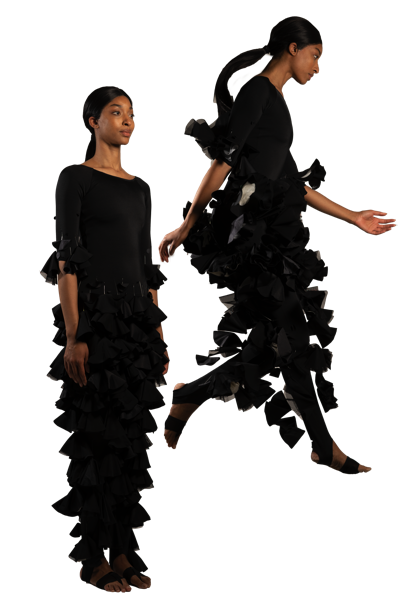 Arise training image: black Tether construction in 4-way power mesh and milliskin, cascading ruffles with visible anchor points